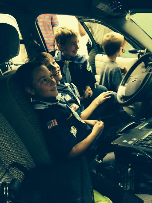 Bear Cubs check out a Vermont State Police cruiser